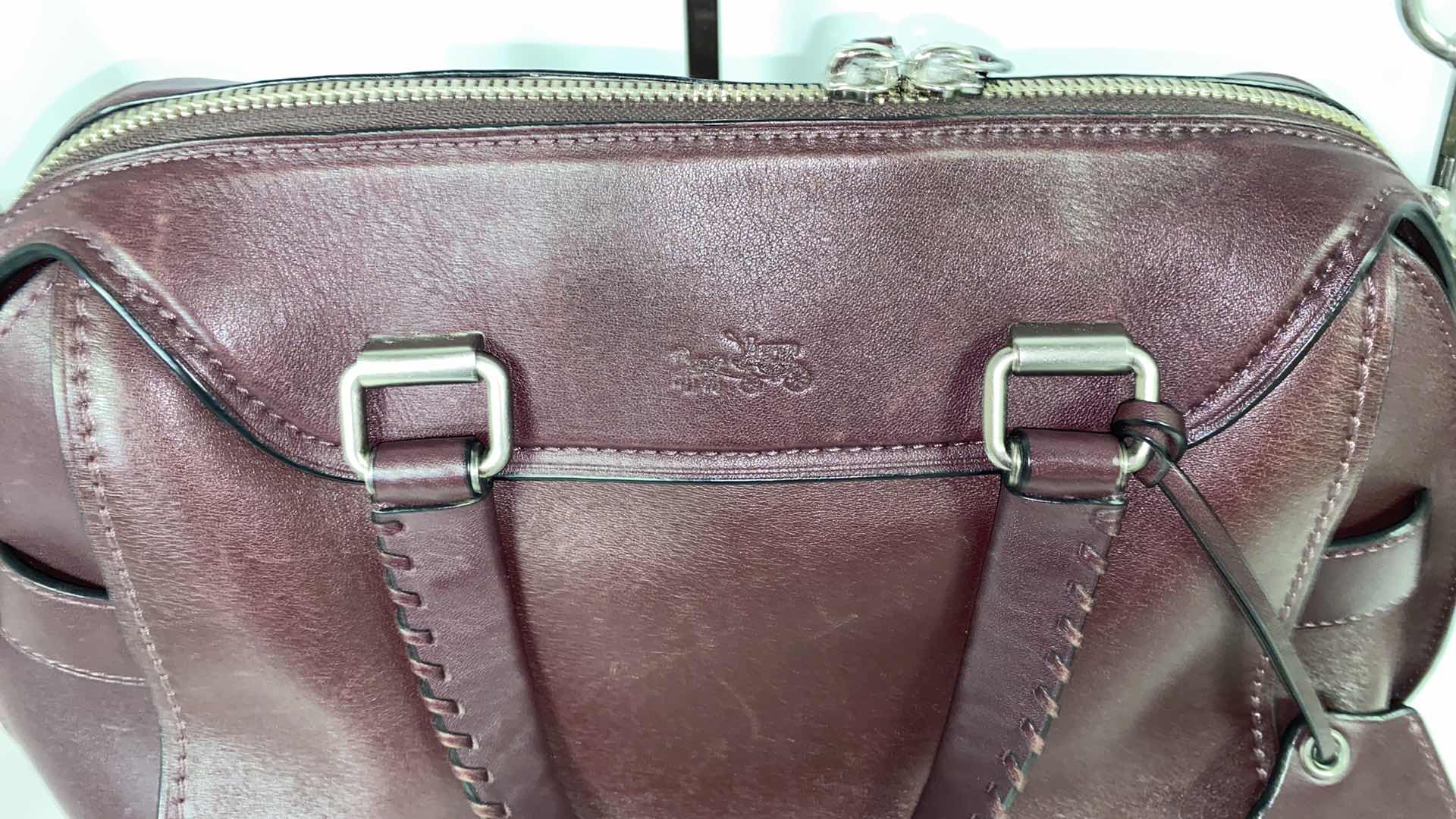 View 3 of COACH  DESIGNER ACE GLOVE TANNED  SMOOTH BURGUNDY LIKE NEW  ORIGINAL $595