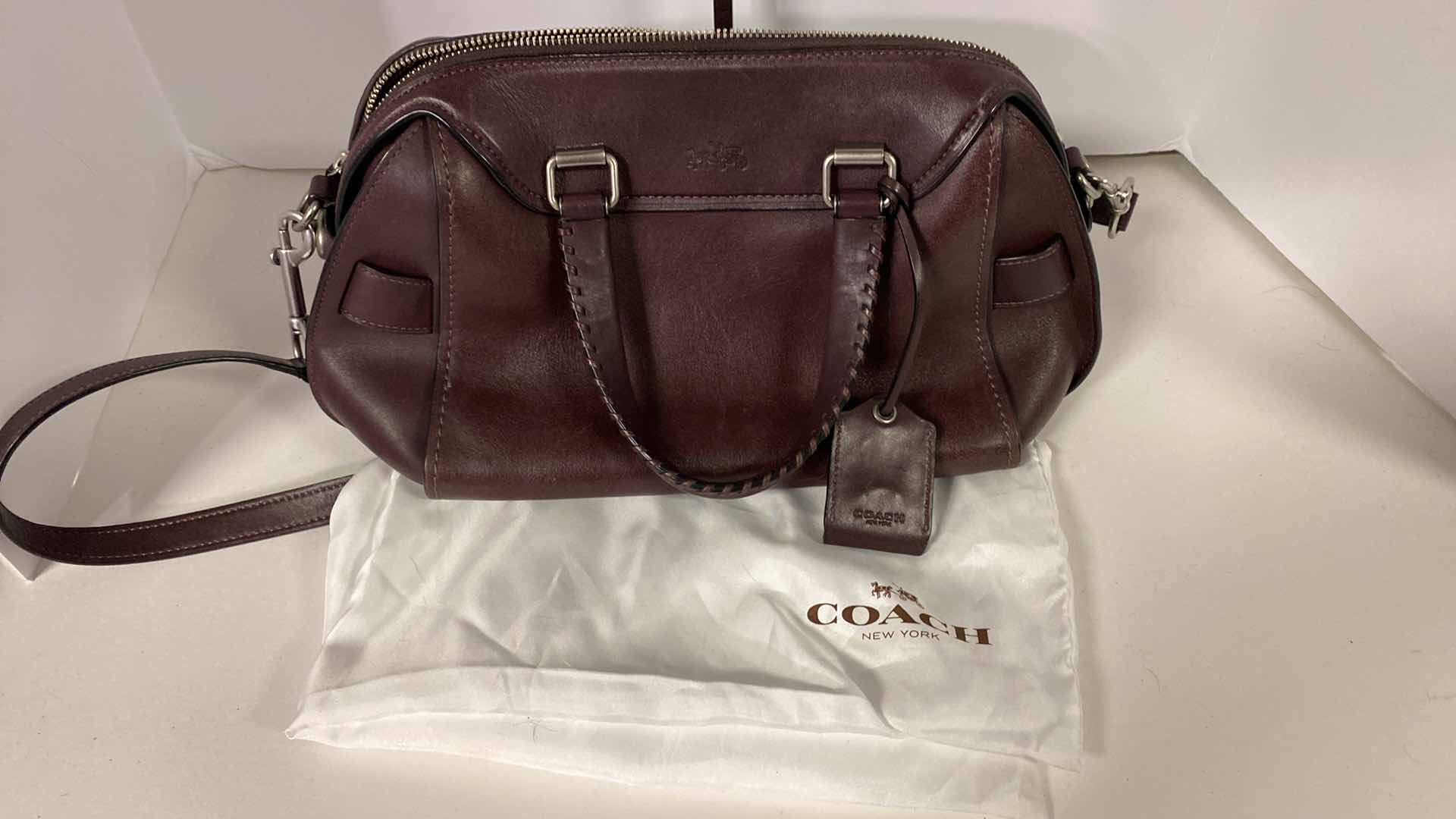 View 9 of COACH  DESIGNER ACE GLOVE TANNED  SMOOTH BURGUNDY LIKE NEW  ORIGINAL $595