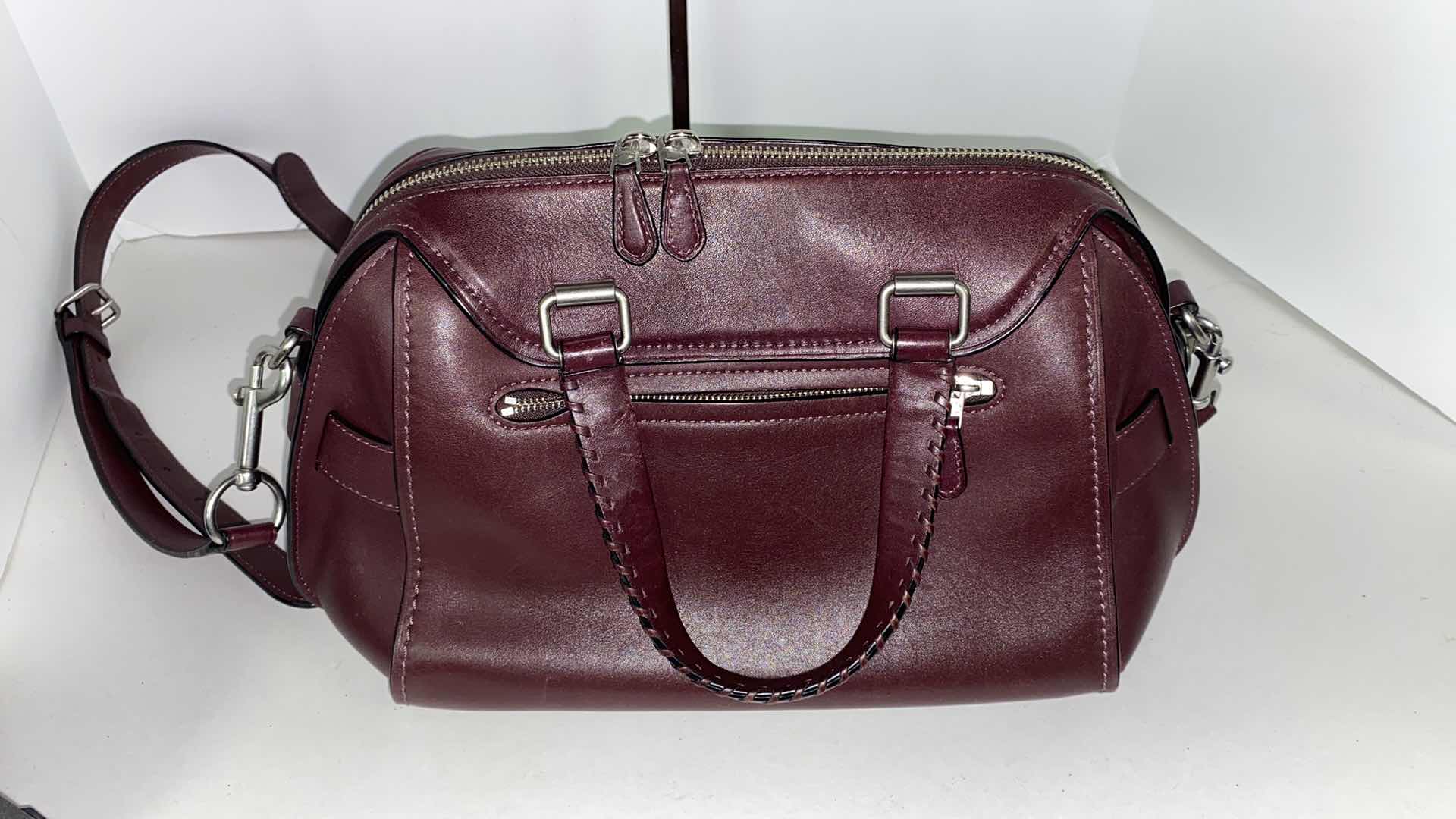 View 5 of COACH  DESIGNER ACE GLOVE TANNED  SMOOTH BURGUNDY LIKE NEW  ORIGINAL $595