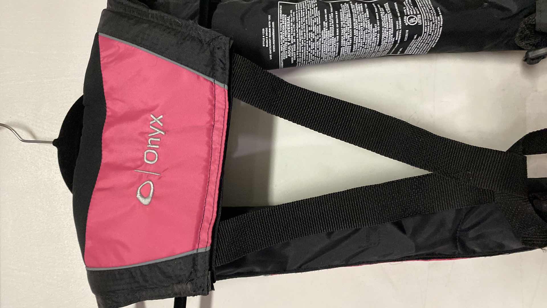 Photo 1 of AM/24 ONYX MANUAL/AUTO PINK LIFE JACKET USED FOR PADDLE BOARDING