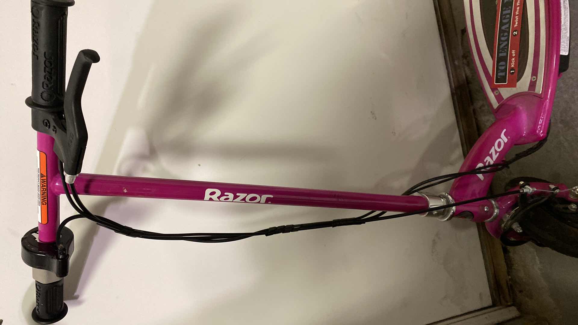 Photo 1 of RAZOR BATTERY POWERED SCOOTER
CHARGING CORD MISSING