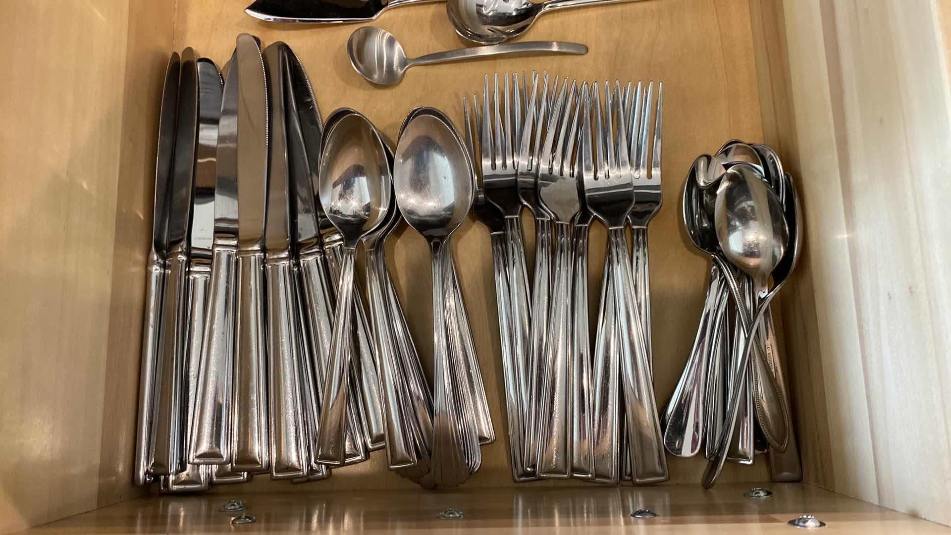 Photo 1 of CONTENTS KITCHEN DRAWERS SILVERWARE AND KNIFES