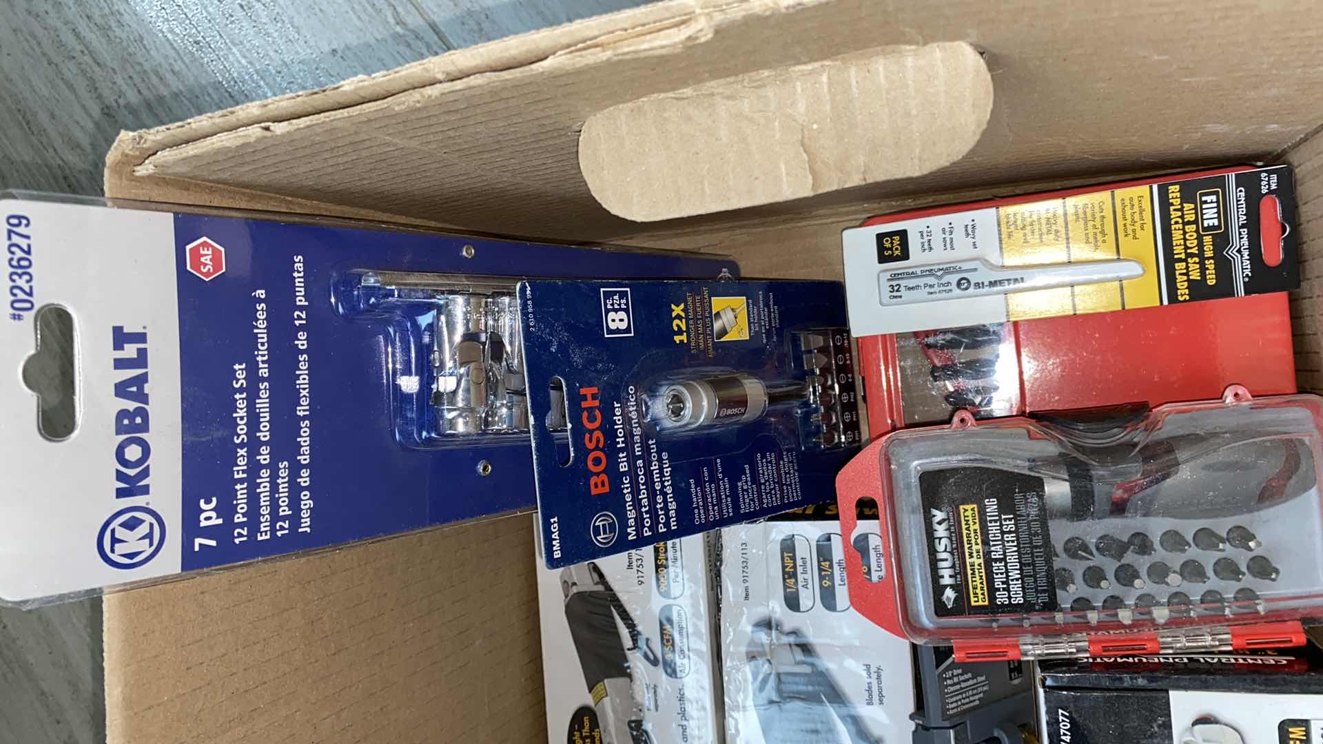 Photo 1 of BOX OF NEW TOOLS