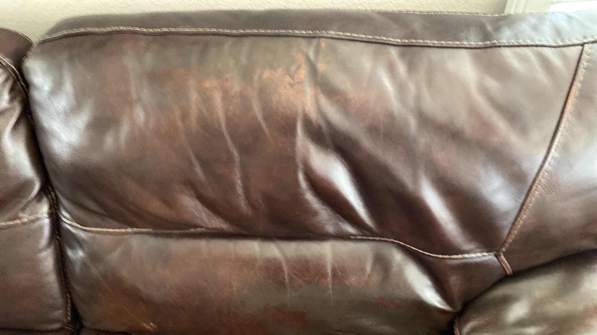 Photo 1 of BONDED LEATHER POWER RECLINER SECTIONAL 115“ x 144”