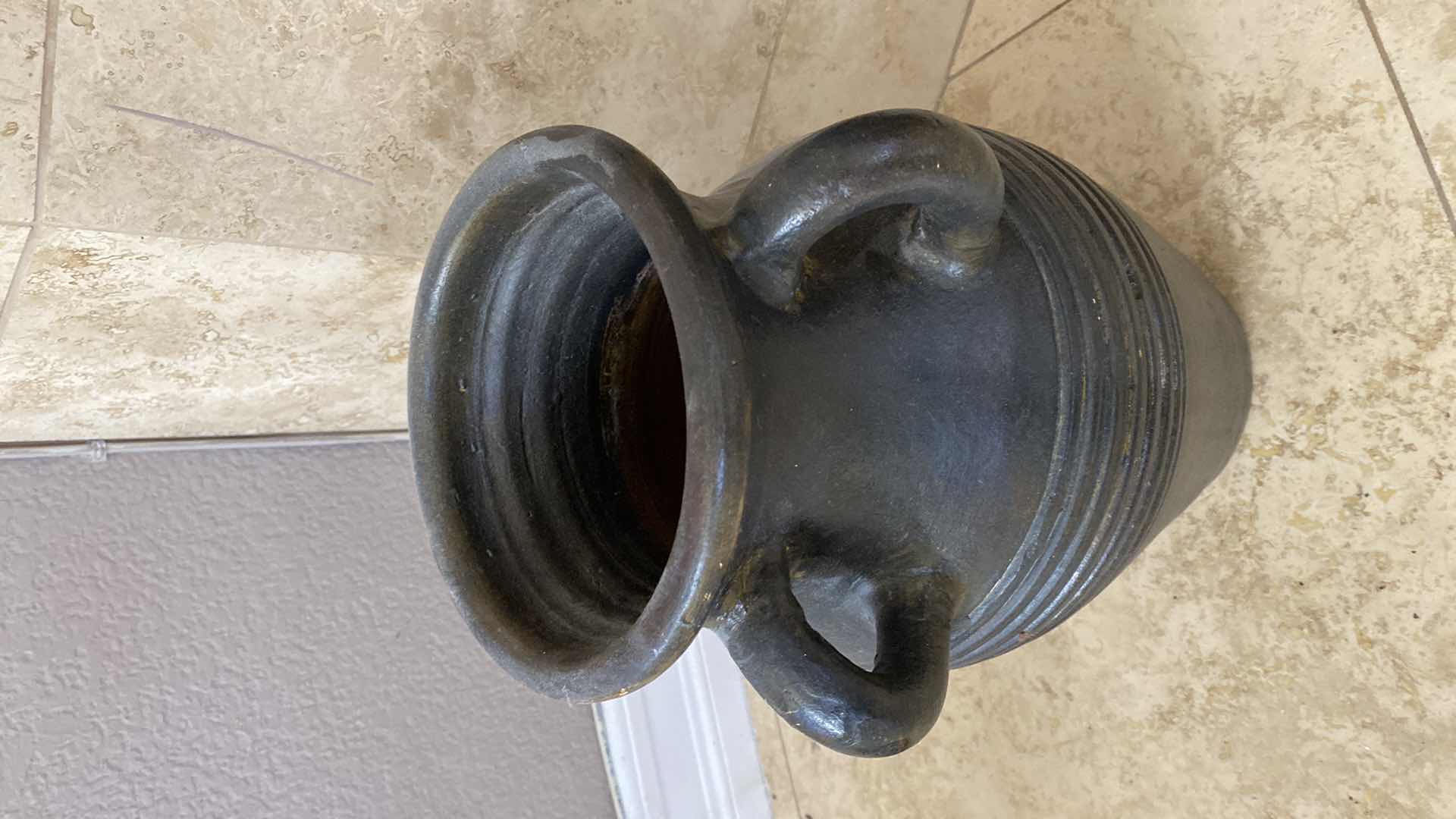 Photo 1 of POTTERY URN WITH ROCKS H 14”