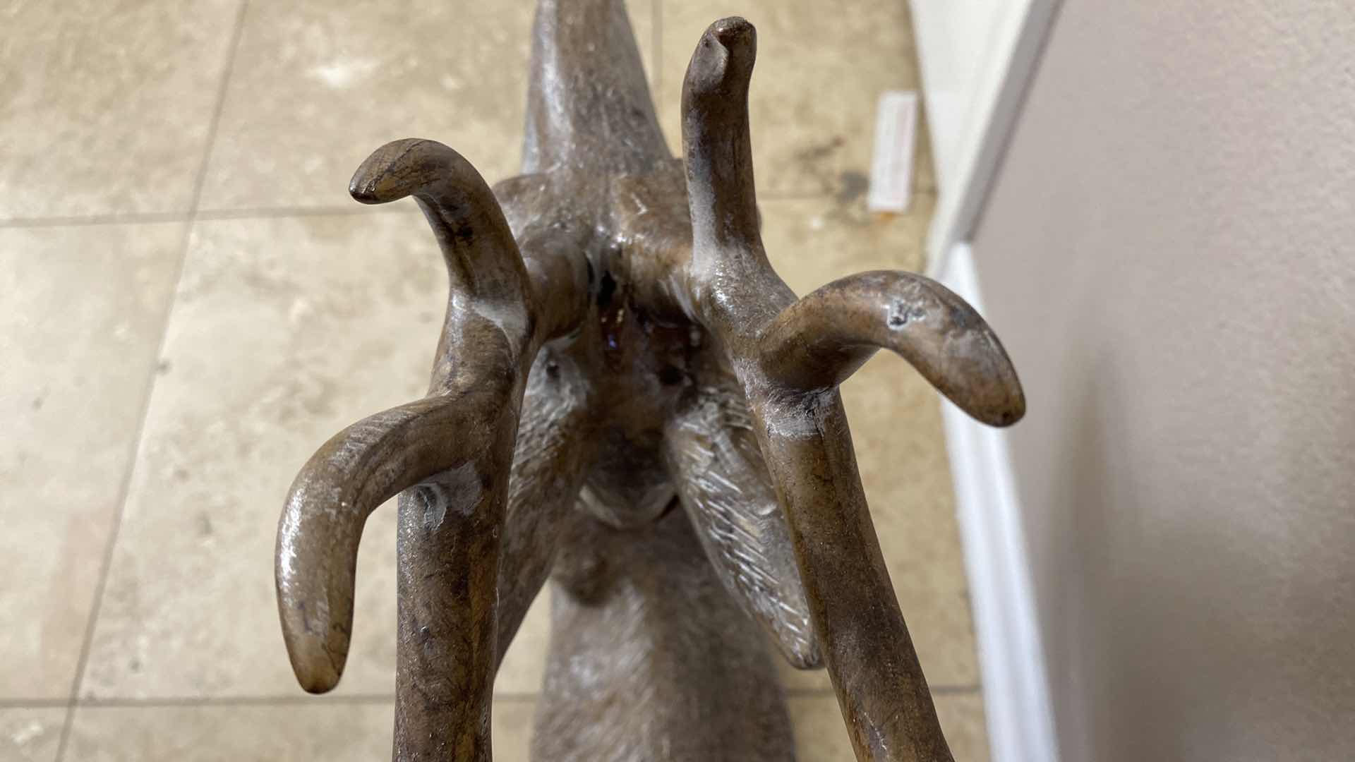 Photo 1 of RESIN DEER ON STAND - GLUED AT ANTLERS 22” x 28”