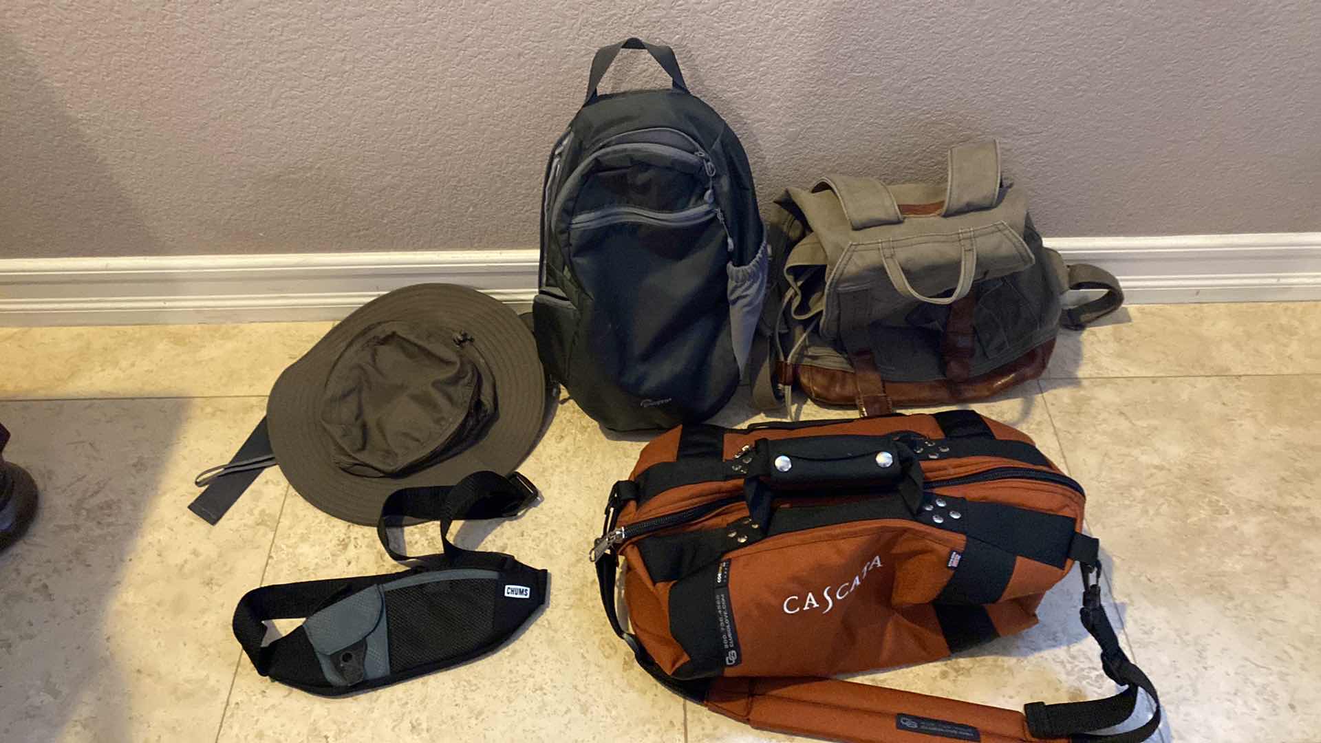 Photo 1 of BACKPACK ASSORTMENT, BAG AND HAT