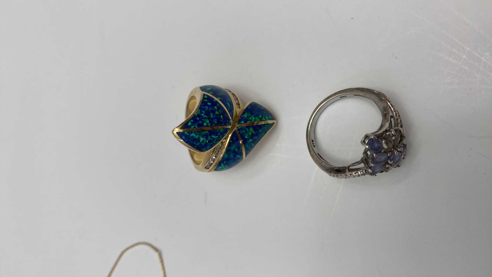 Photo 1 of GOLD AND SILVER JEWELRY -14K  3 RINGS AND BRACELET, 585 BLUE RING, 575 STONE MISSING CLUSTER RING, 925 SILVER NECKLACE