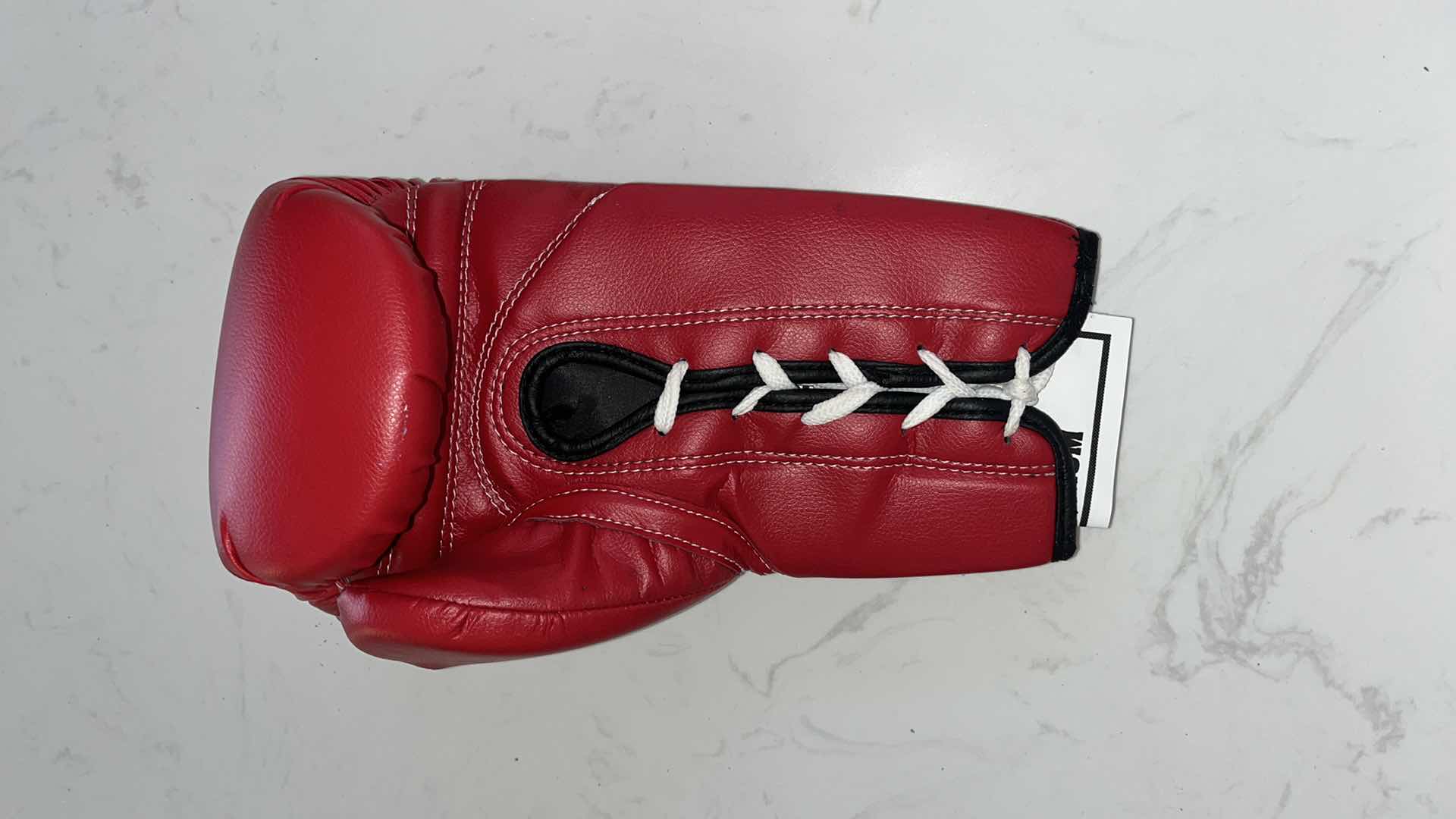 Photo 1 of RED TITLE BOXING GLOVE SIGNED BY “SUGAR” SHANE MOSLEY AND FLOYD MAYWEATHER Jr.