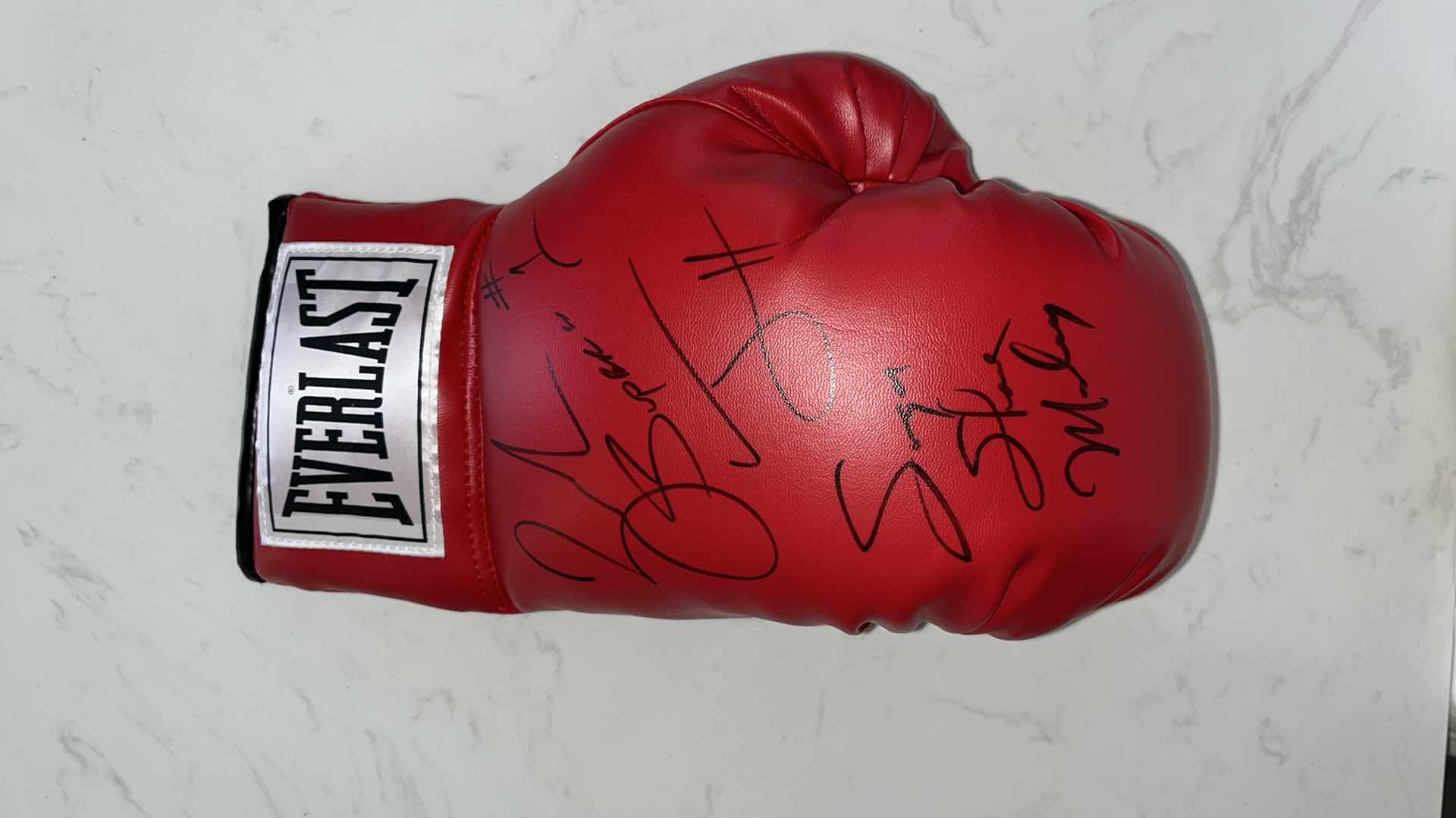 Photo 1 of RED EVERLAST BOXING GLOVE SIGNED BY “SUGAR” SHANE MOSLEY AND ZAB “SUPER” JUDAH