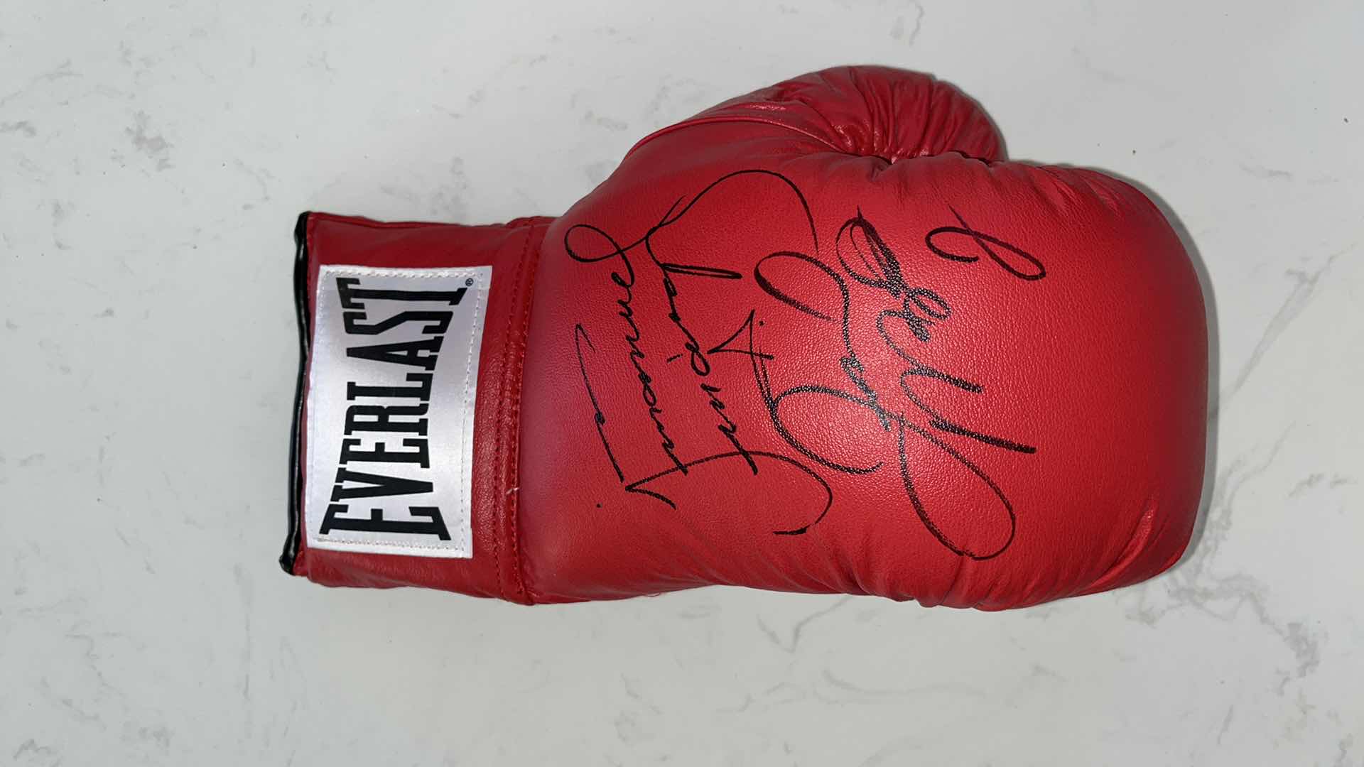 Photo 1 of RED EVERLAST BOXING GLOVE AUTOGRAPHED BY FLOYD MAYWEATHER Jr. & JUAN MANUEL MARQUEZ