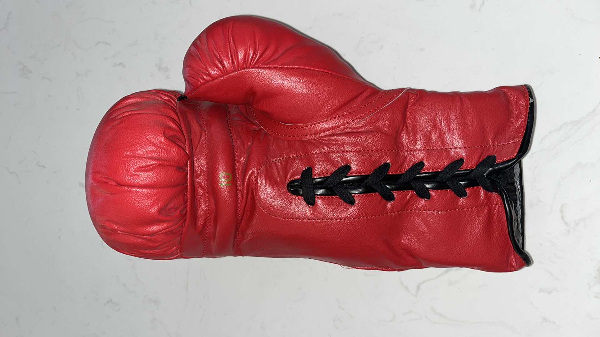Photo 1 of RED EVERLAST BOXING GLOVE AUTOGRAPHED BY FLOYD MAYWEATHER Jr. & JUAN MANUEL MARQUEZ