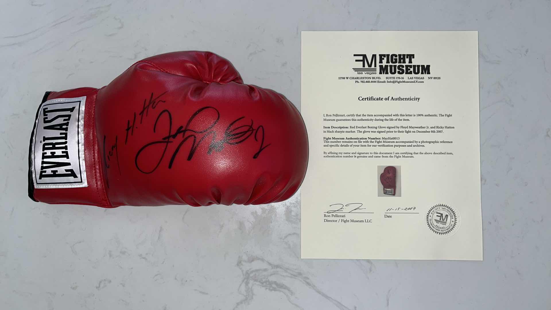 Photo 1 of RICKY HATTON AND FLOYD MAYWEATHER Jr. AUTOGRAPHED GLOVE