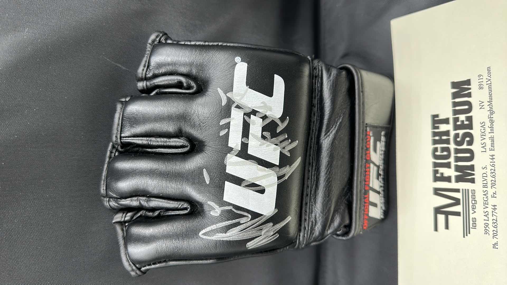 Photo 1 of KARO PARISYAN SIGNED UFC GLOVE W COA