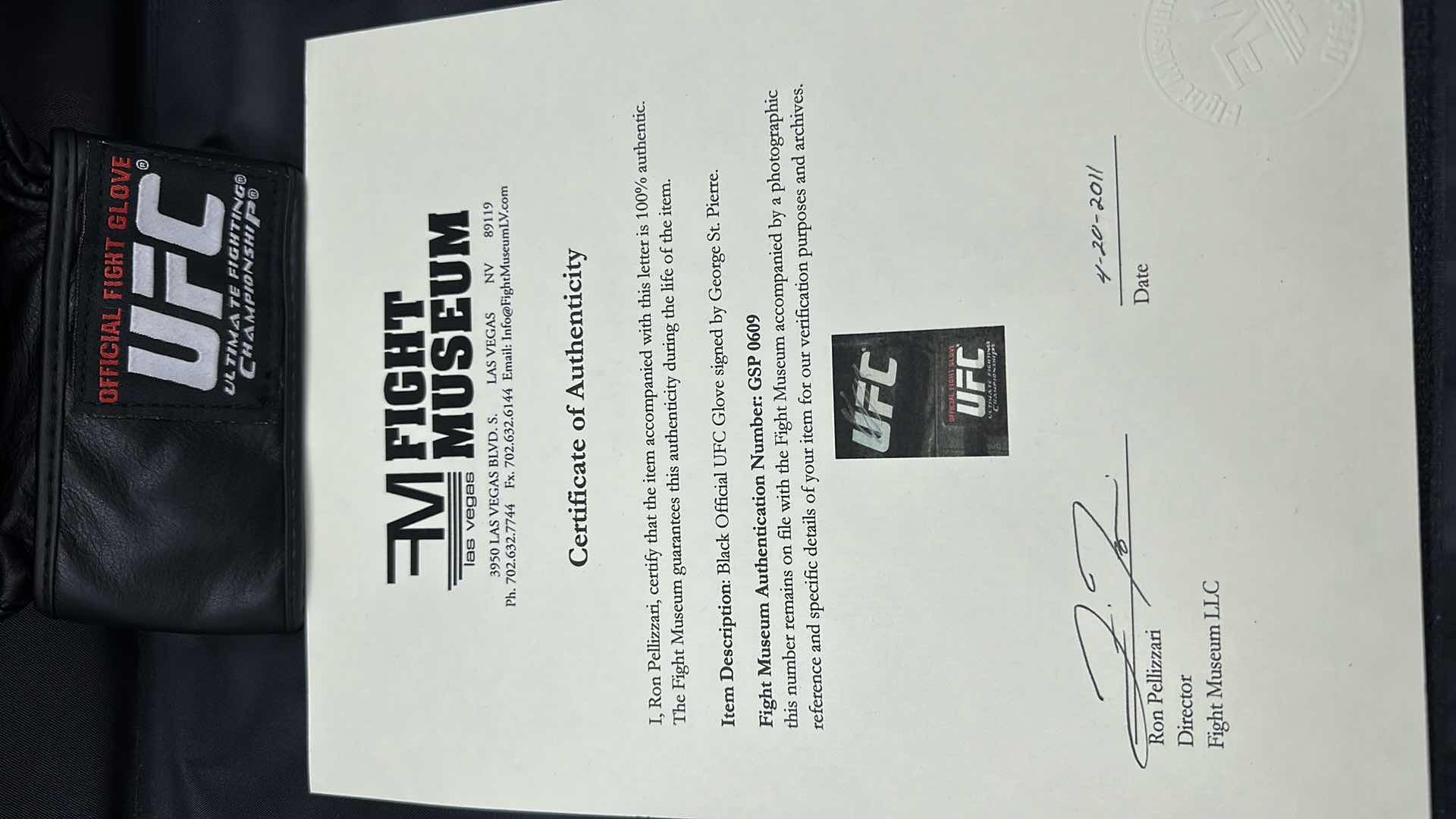 Photo 1 of GEORGE ST. PIERRE SIGNED UFC GLOVE W COA