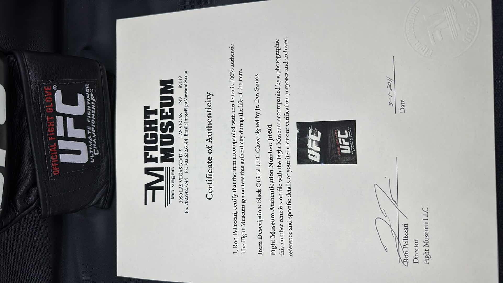Photo 1 of JR. DOS SANTOS SIGNED UFC GLOVE W COA