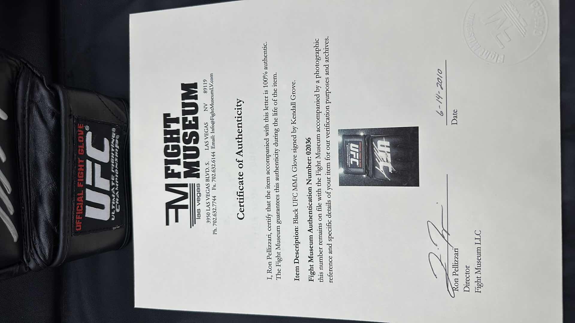 Photo 1 of KENDALL GROVE SIGNED UFC GLOVE W COA