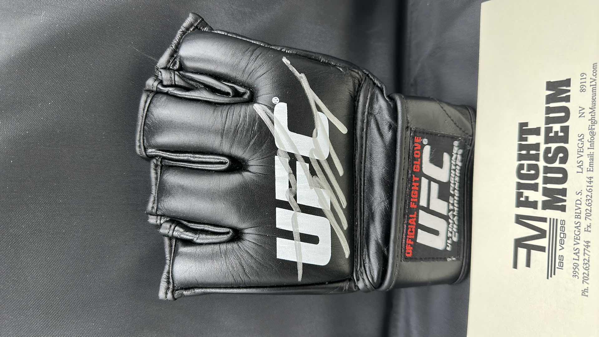 Photo 1 of KENDALL GROVE SIGNED UFC GLOVE W COA