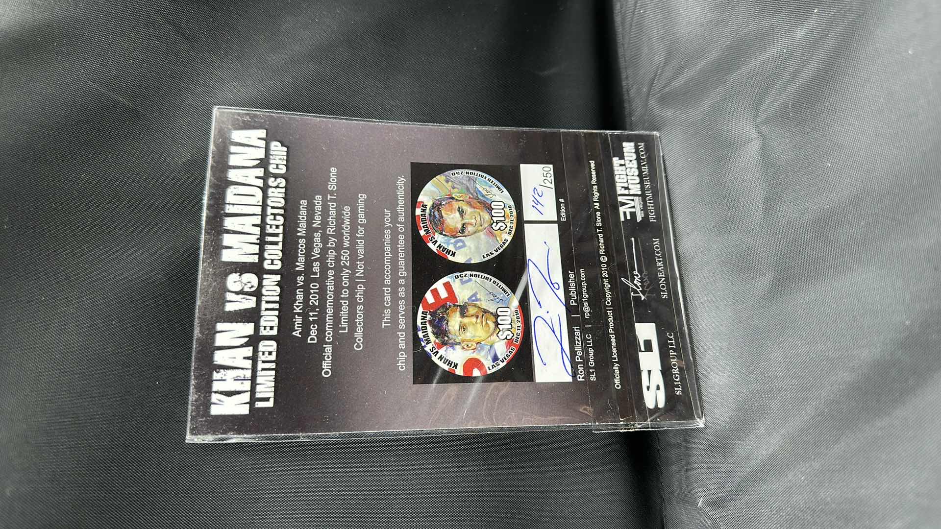 Photo 1 of KHAN VS MAIDANA LIMITED EDITION $100 COLLECTORS COIN NUMBERED 142/250