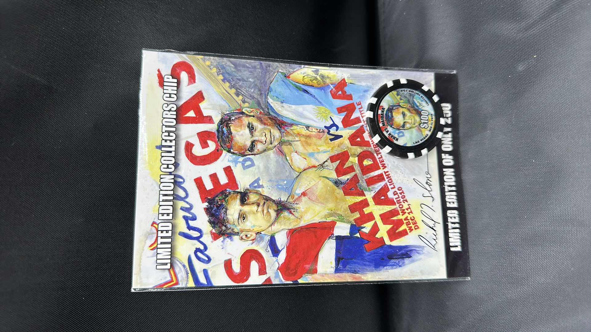 Photo 1 of KHAN VS MAIDANA LIMITED EDITION $100 COLLECTORS COIN NUMBERED 143/250