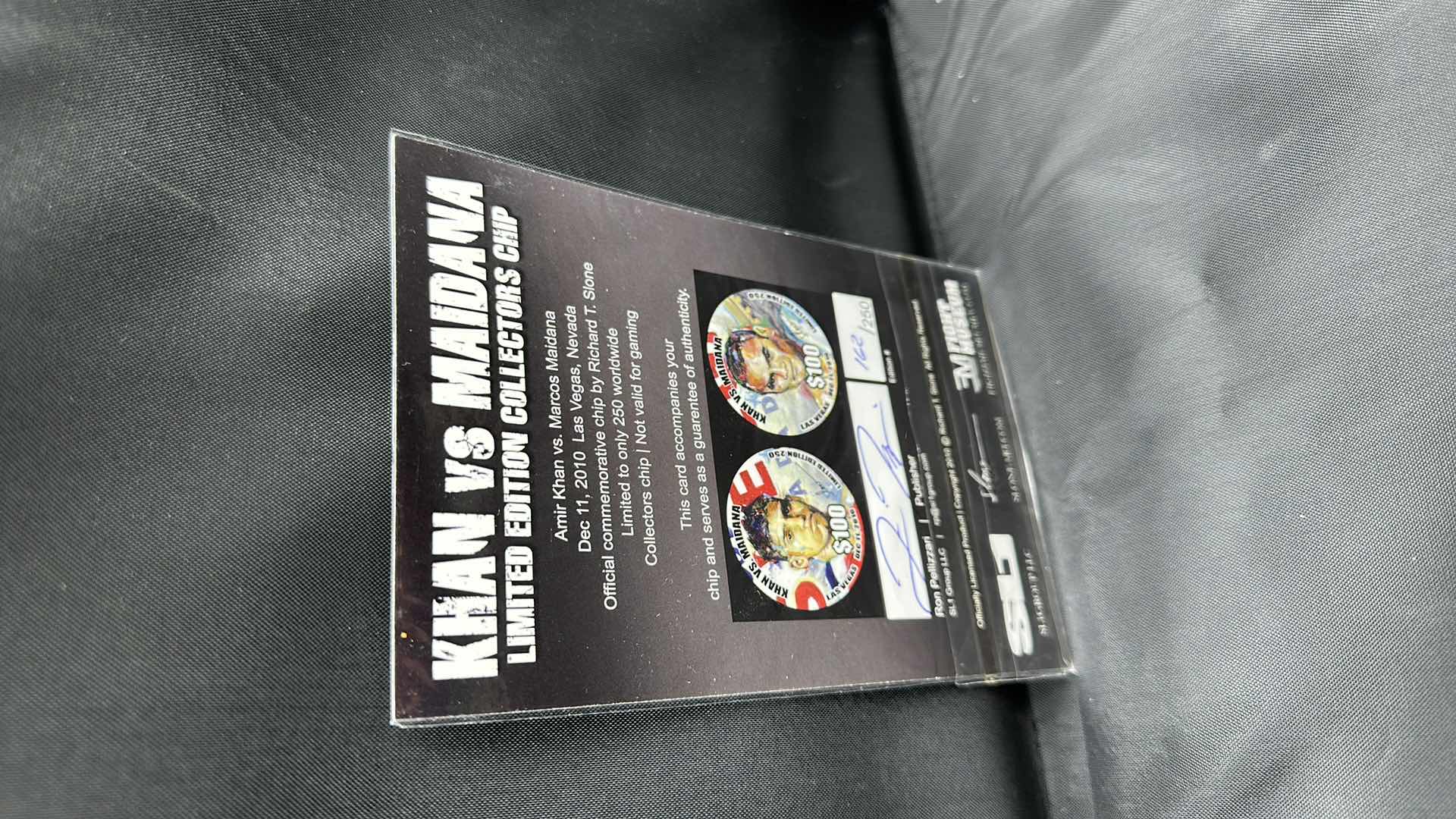 Photo 1 of KHAN VS MAIDANA LIMITED EDITION $100 COLLECTORS COIN NUMBERED 162/250