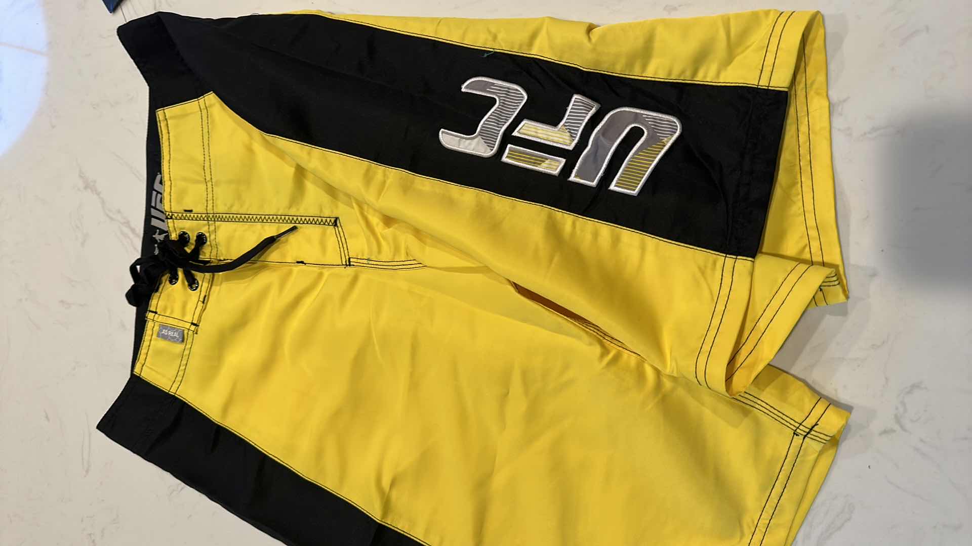 Photo 1 of OFFICIAL UFC FIGHTING TRUNKS SIZE 30