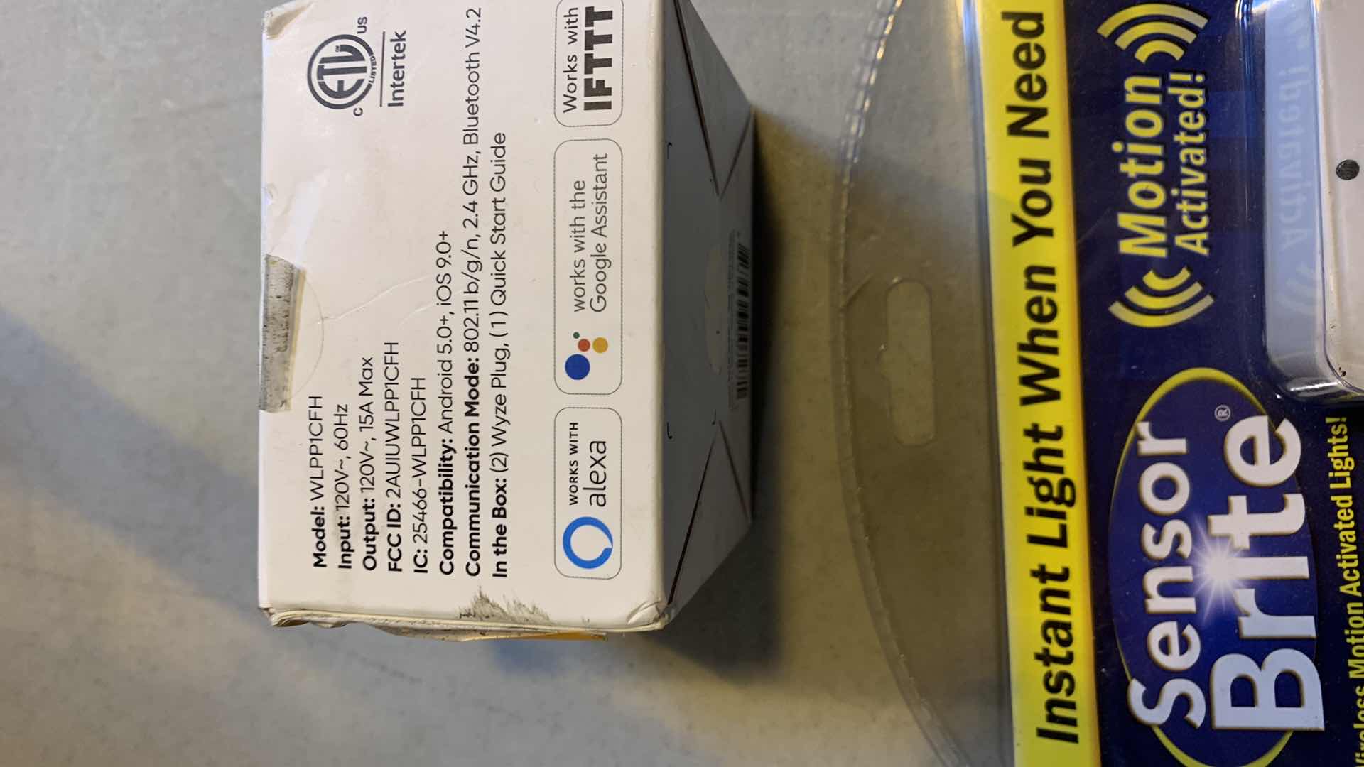 Photo 1 of WYZE PLUG 2 PACK AND PAIR OF MOTION ACTIVATED LIGHTS