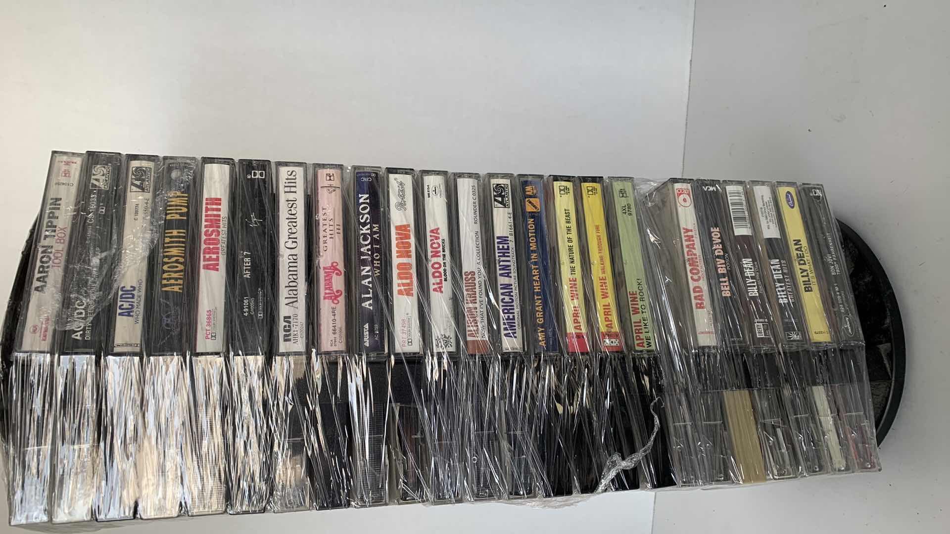 Photo 1 of MUSIC CASSETTES AND HOLDER