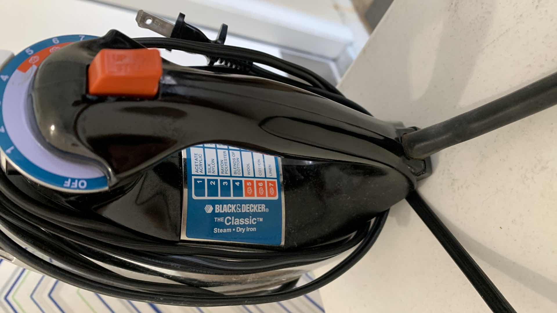 Photo 2 of IRONING BOARD AND BLACK AND DECKER IRON