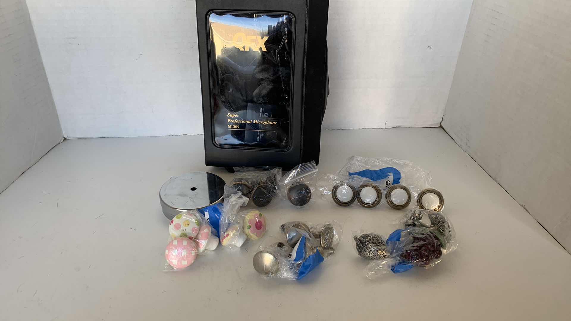 Photo 1 of DRAWER HANDLES AND QFX MICROPHONE