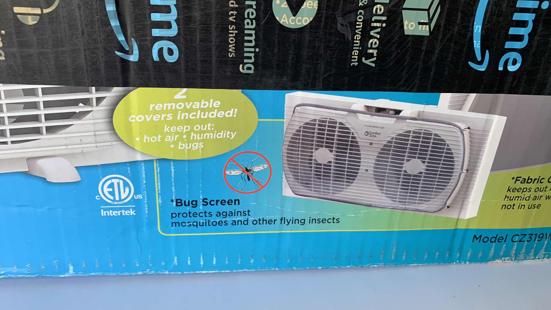 Photo 1 of COMFORT ZONE PORTABLE TWIN WINDOW FAN