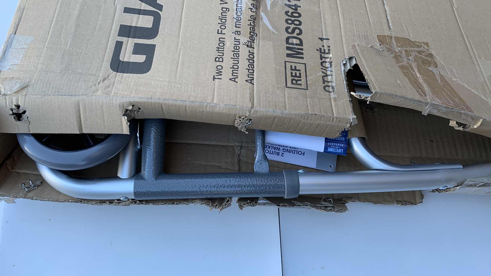 Photo 1 of GUARDIAN TWO BUTTON FOLDING WALKER WITH 5” WHEELS