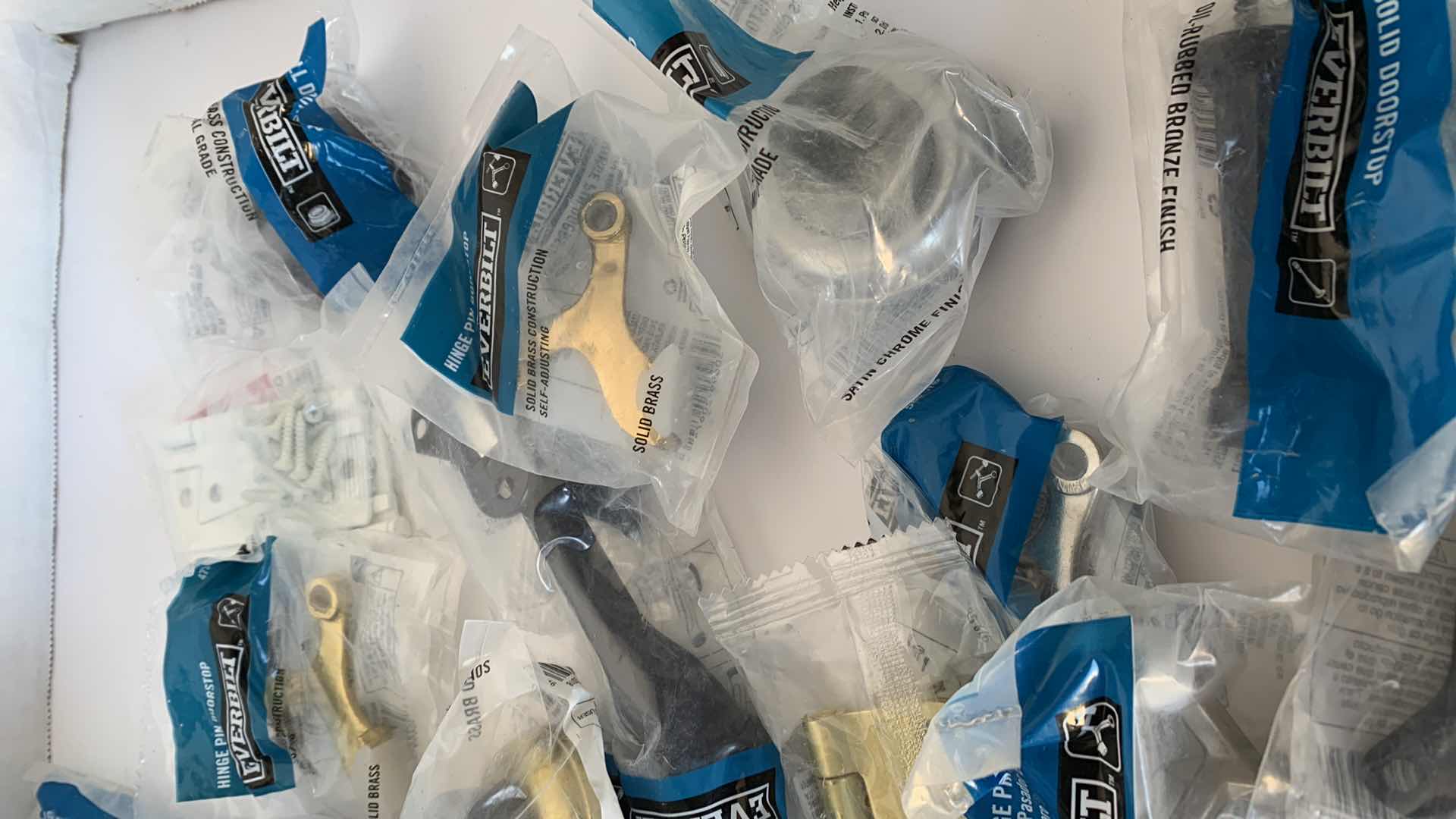 Photo 1 of ASSORTED HINGES, DOOR STOPS, HOME HARDWARE