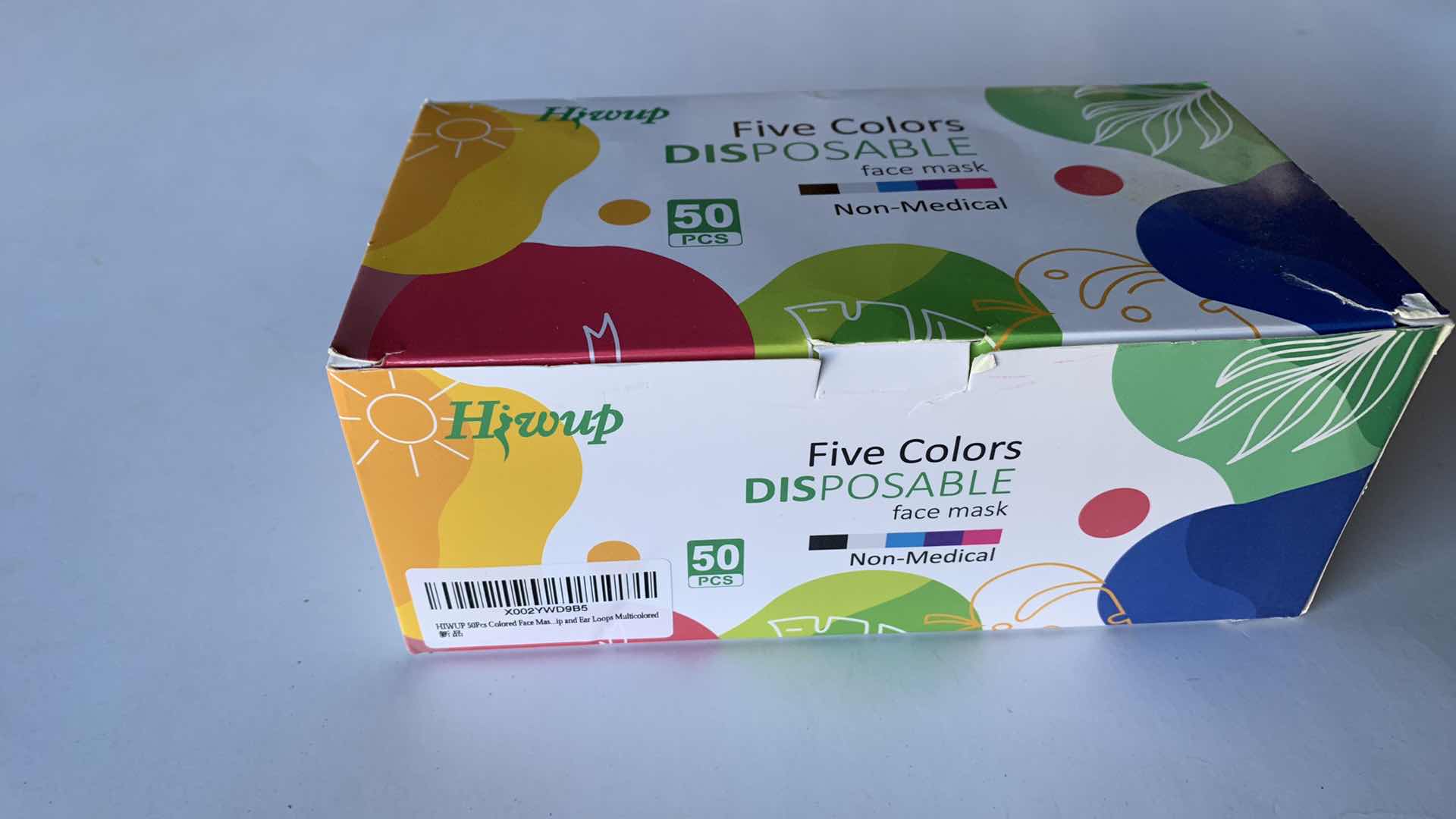 Photo 1 of SEVENTEEN BOXES OF FIFTY MULTICOLORED FACE MASKS