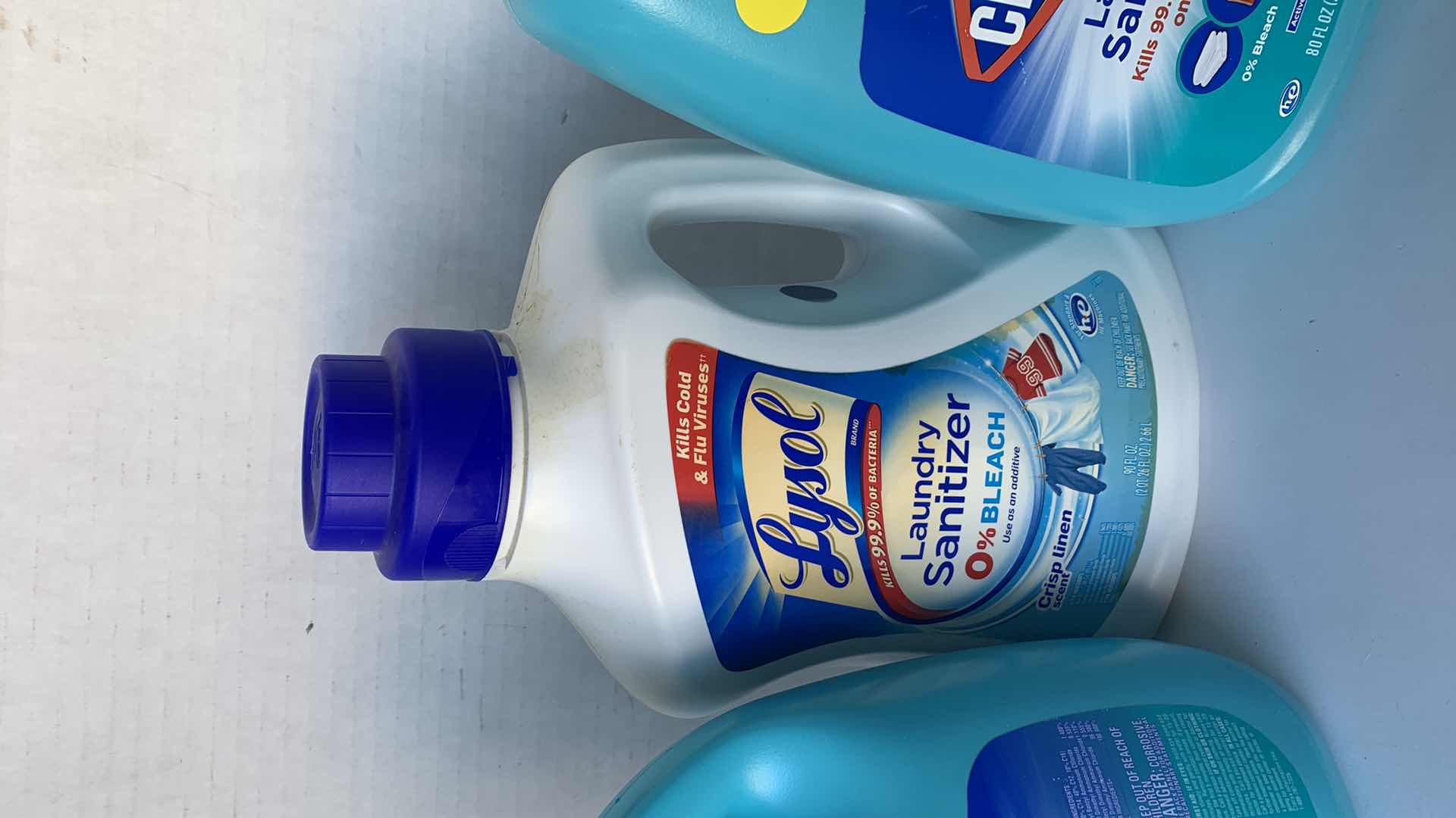Photo 1 of THREE LAUNDRY SANITIZER’S: CLOROX AND LYSOL