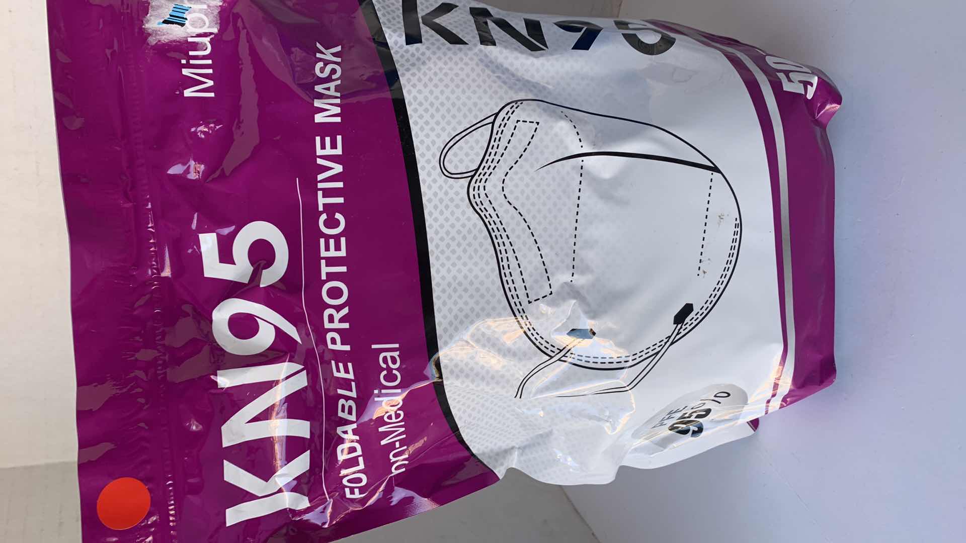 Photo 1 of TWO KN95 PROTECTIVE MASKS 100 COUNT