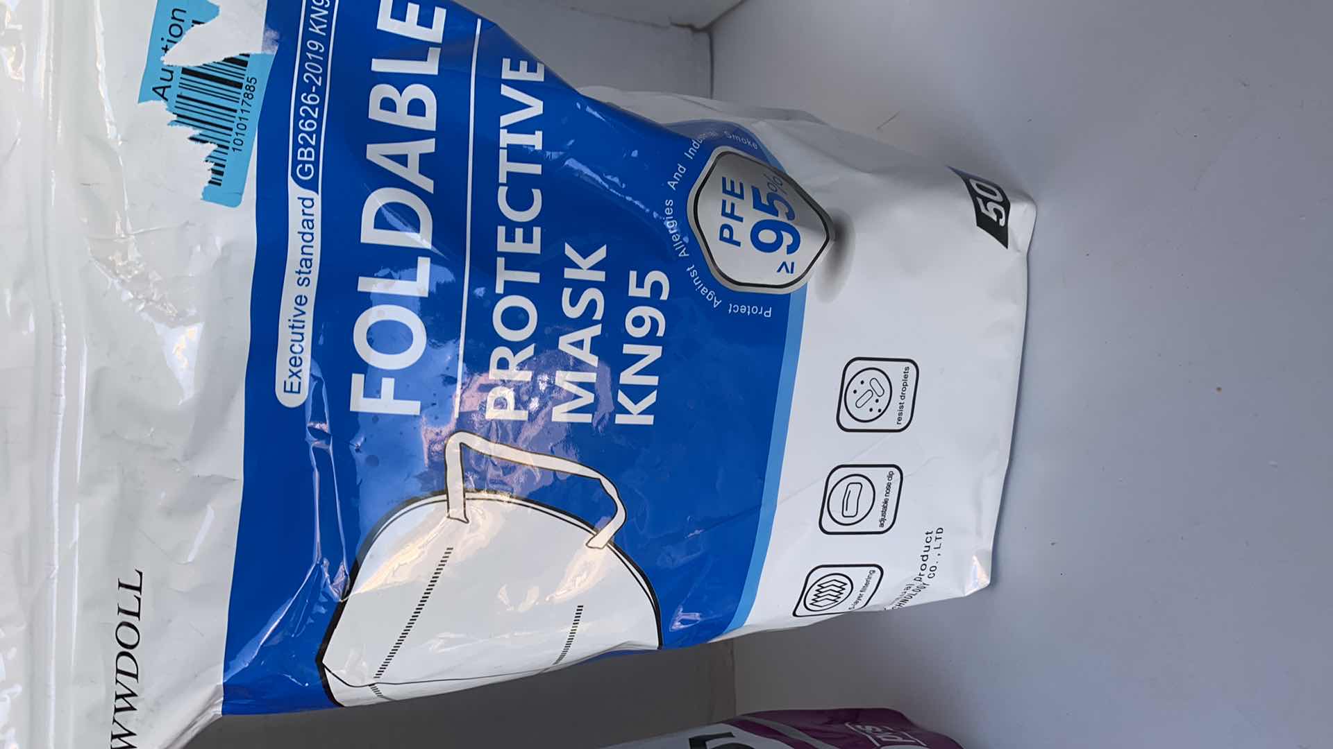 Photo 1 of TWO KN95 PROTECTIVE MASKS 100 COUNT