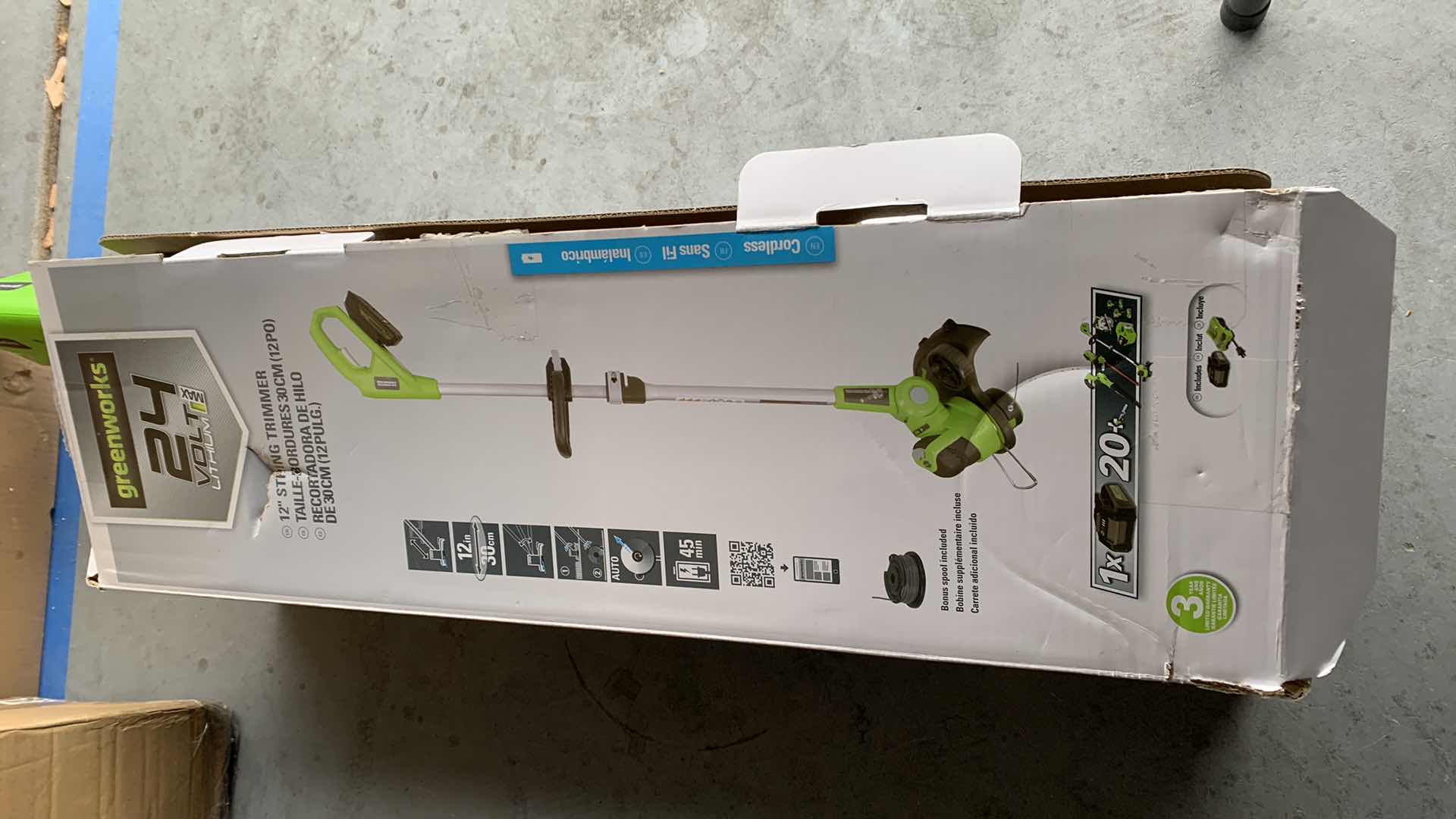 Photo 1 of GREENWORKS 12” STRING TRIMMER WITH LITHIUM BATTERY