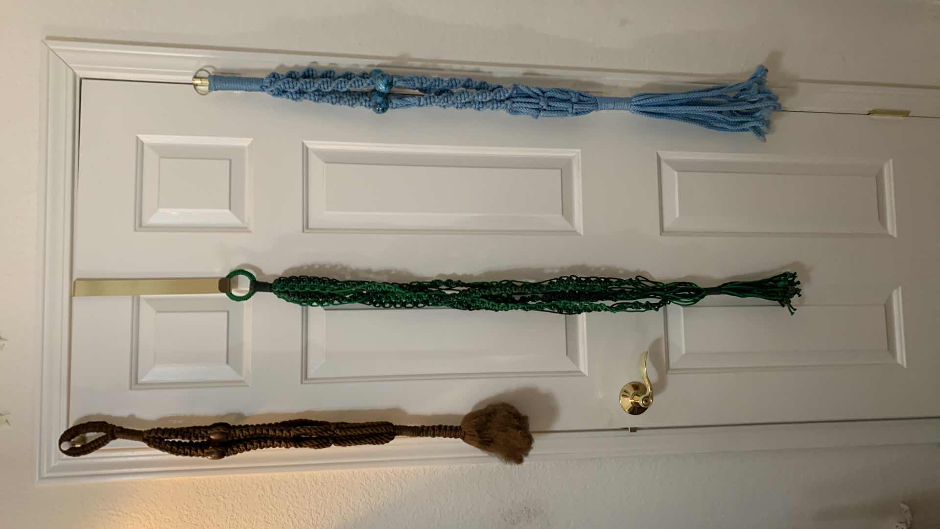 Photo 1 of THREE HANDMADE MACRAME POT HOLDERS APPROXIMATELY 36” LONG