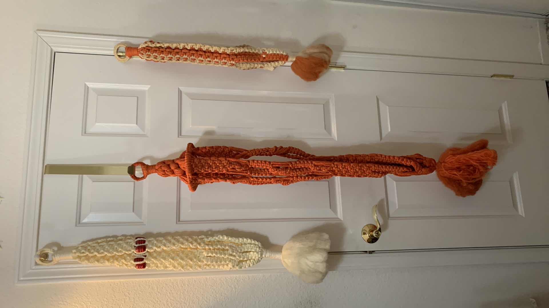 Photo 1 of THREE HANDMADE MACRAME POT HOLDERS APPROXIMATELY 36” LONG