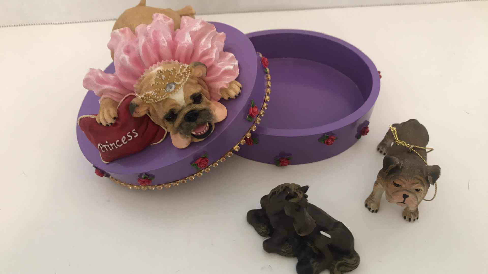 Photo 1 of 6” OVAL WOODEN BOX WITH PAMPERED DOG ATOP, AND THREE SMALL RESIN ANIMALS