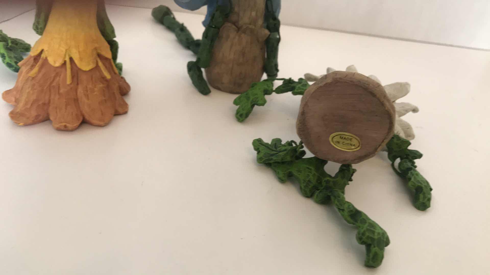 Photo 1 of 3 CERAMIC FLOWER CHARACTERS WITH VINE ARMS AND LEGS, APPROX 5” SITTING