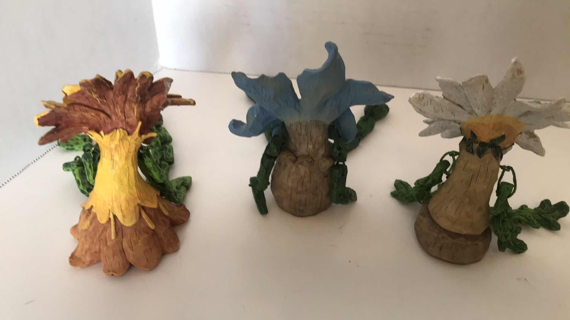Photo 1 of 3 CERAMIC FLOWER CHARACTERS WITH VINE ARMS AND LEGS, APPROX 5” SITTING
