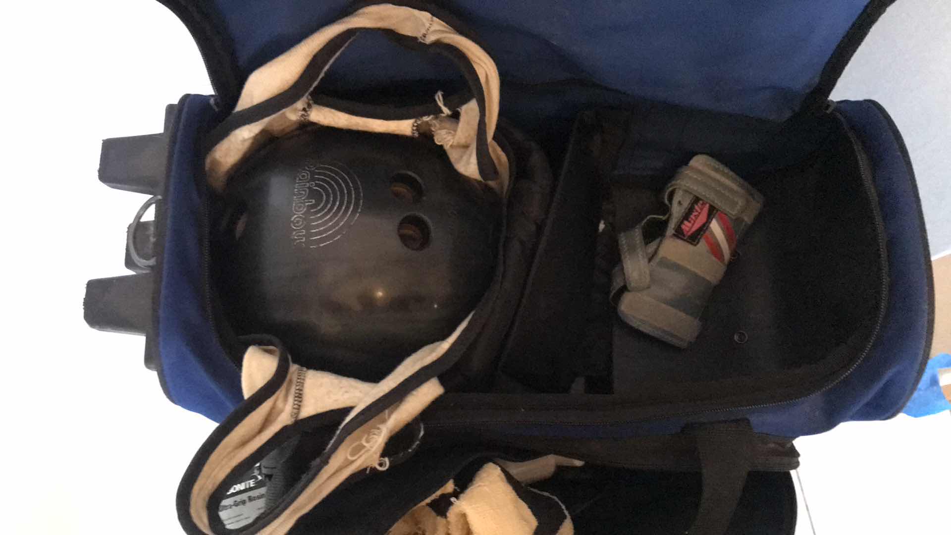 Photo 1 of MEN’S BOWLING BALL IN BAG WITH ACCESSORIES