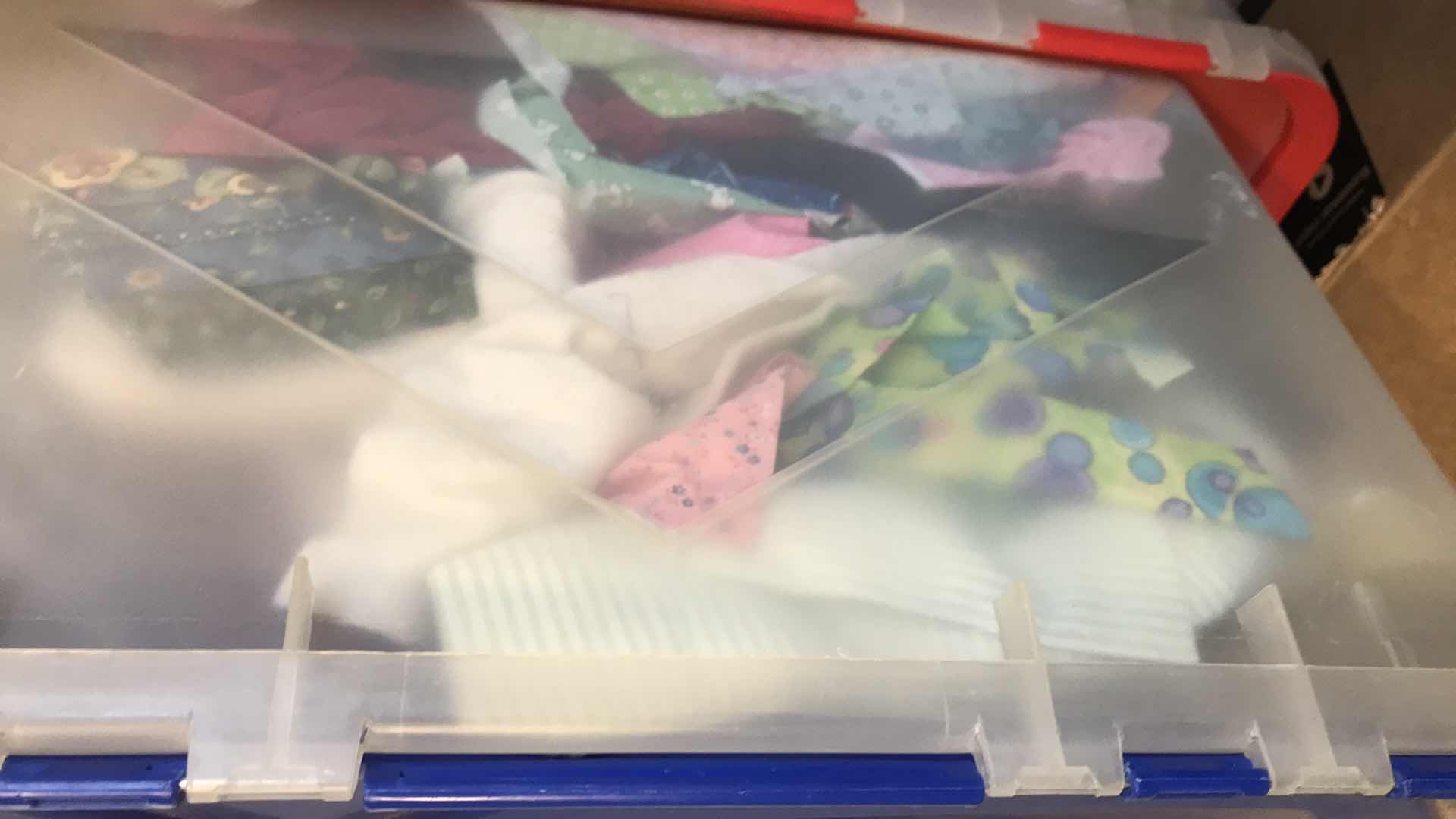 Photo 1 of LARGE BIN OF FABRIC REMNANTS FOR QUILTING