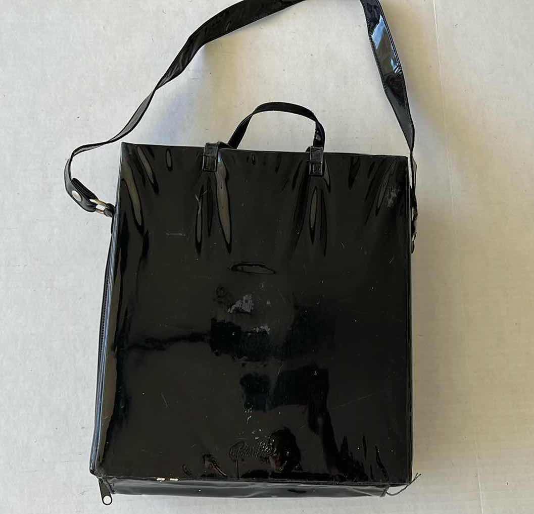 Photo 1 of BARBIE BAG WITH CLOTHING ITEMS AND ACCESSORIES 11” X 12”