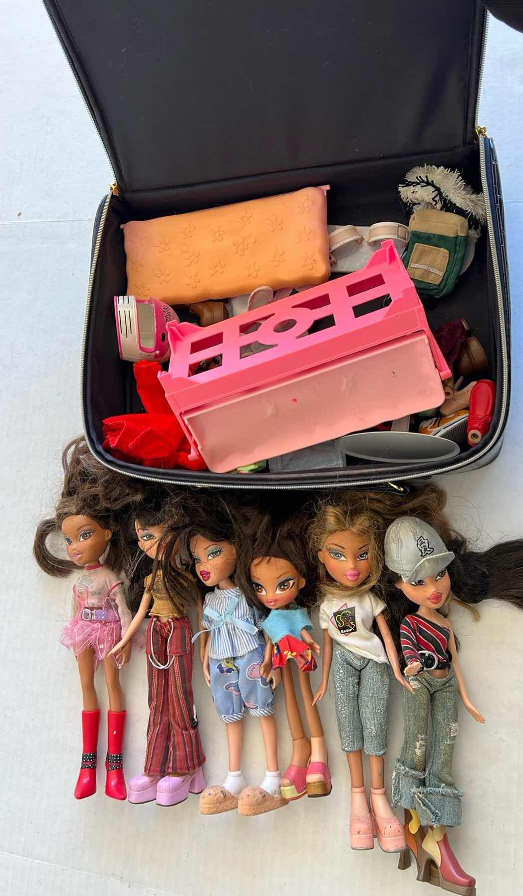 Photo 1 of COLLECTION OF BRATZ DOLLS AND BAG WITH DOLLS CLOTHING ITEMS