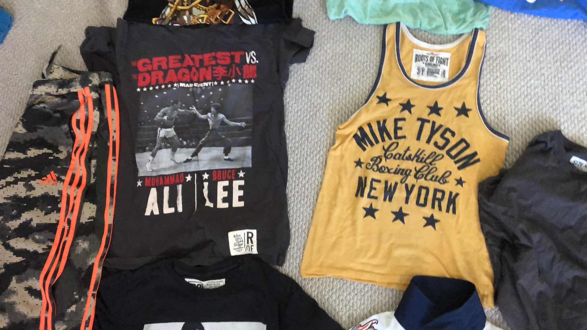 Photo 1 of ASSORTMENT OF GRAPHIC  TEE SHIRTS AND ADIDAS PANTS