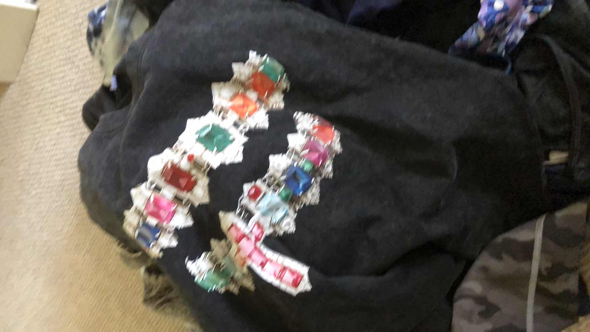 Photo 1 of CONTENTS OF BAG ZIP UP JACKETS PLAID SHIRTS ASSORTED SIZES