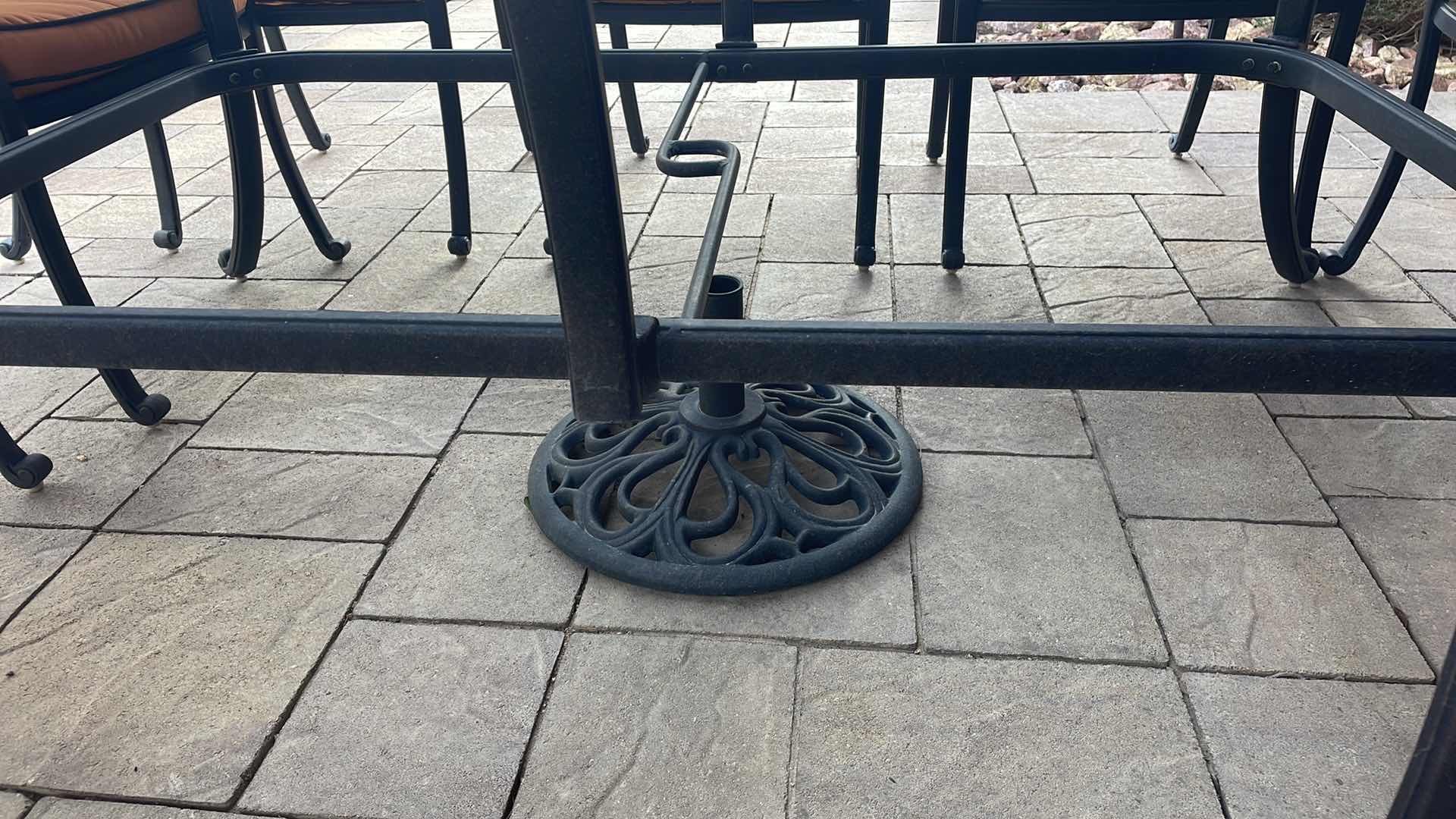 Photo 1 of LUXURY PATIO FURNITURE SET - TABLE 64” X 90” WITH 10 CHAIRS ORANGE CUSHIONS WITH BLACK WELTING